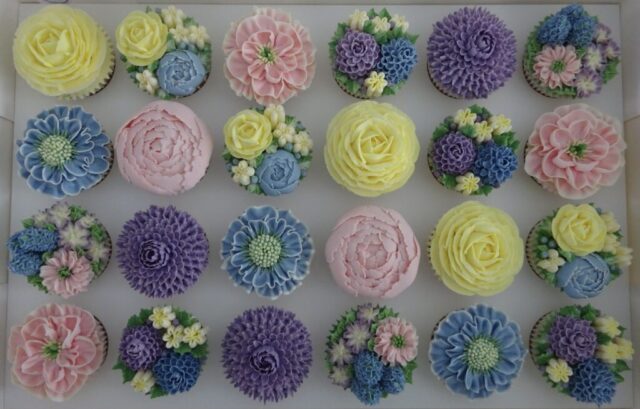 "Boxed Floral Cupcakes in Spring Shades"